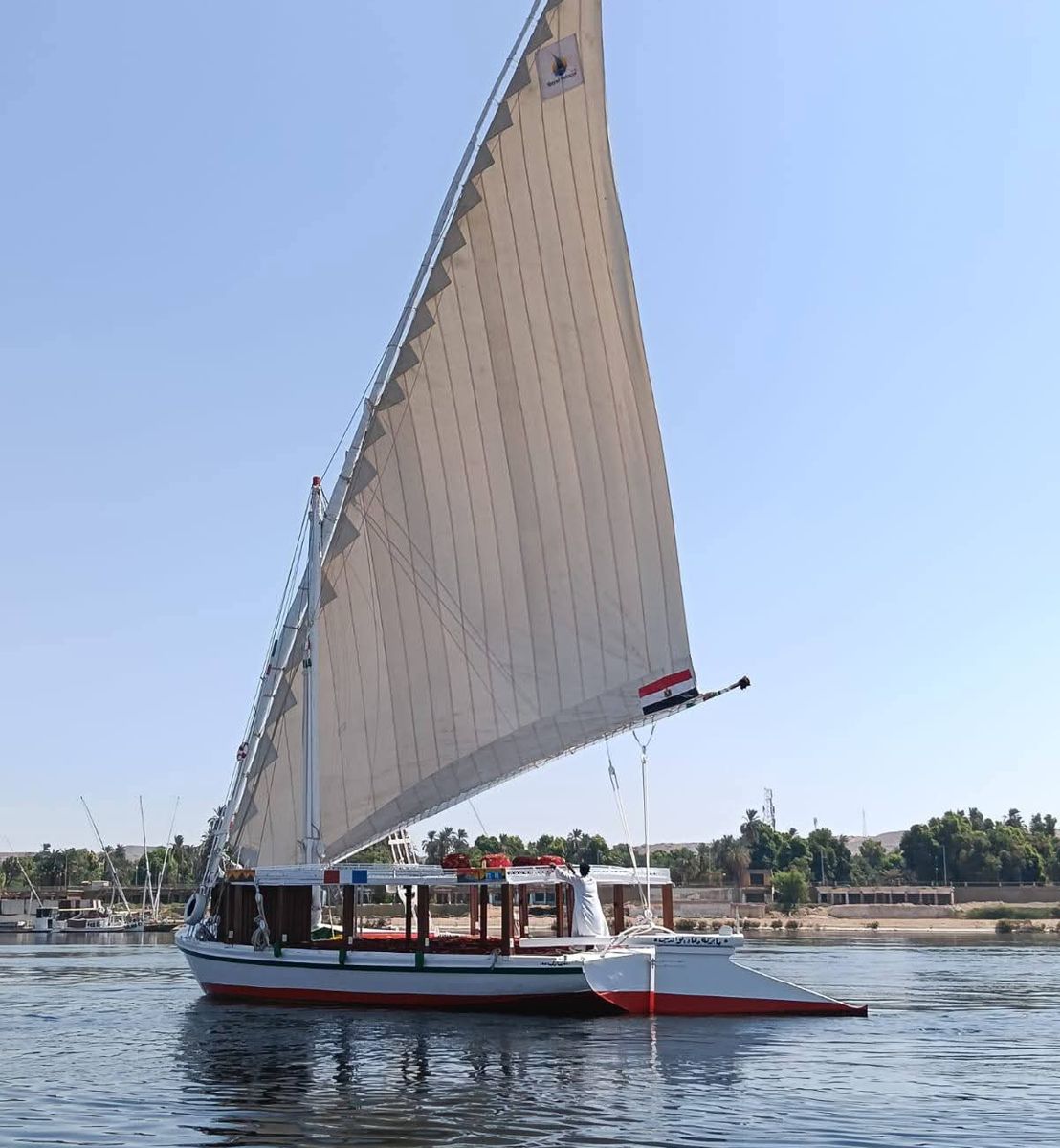 White felucca sailing on the Nile